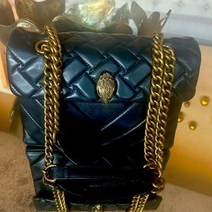 Kurt Geiger purse very chic you can dress it up or down , brass hardware